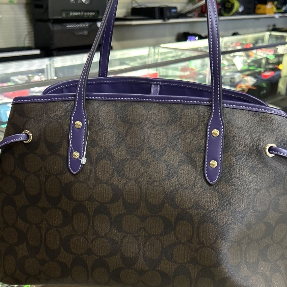 Authentic--->COACH Signature Brown and Purple Drawstring Shoulder Bag - F57842
